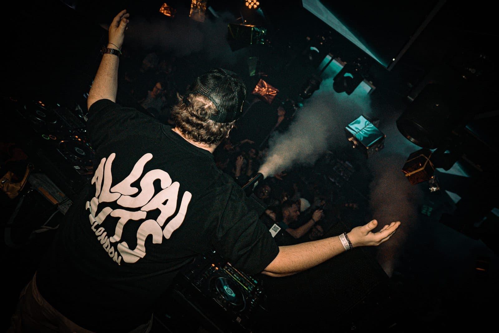 Rotation Sensation DJing over a packed dance floor